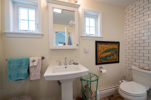3 Clark Ave, Old Saybrook, CT 06475 - bathroom featuring toilet, a baseboard heating unit, and tile walls