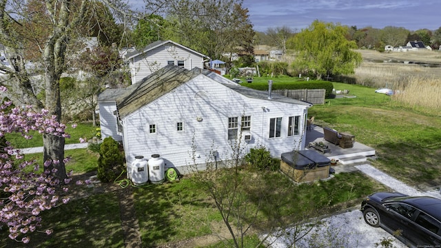 3 Clark Ave, Old Saybrook, CT 06475 - rear view of house with a lawn and roof with shingles