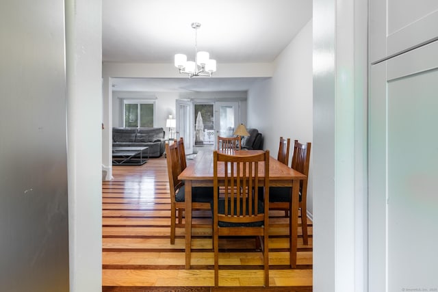 201 Greens Farm Rd Unit 201, Branford, CT 06405 - dining area featuring a chandelier and wood finished floors