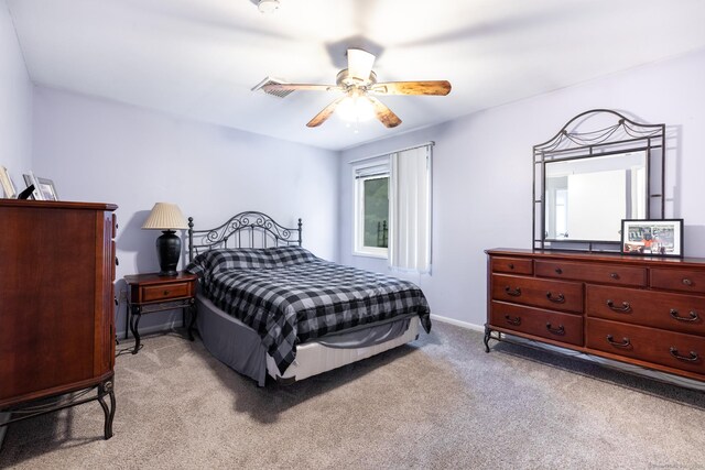 201 Greens Farm Rd Unit 201, Branford, CT 06405 - bedroom with light carpet, ceiling fan, and baseboards