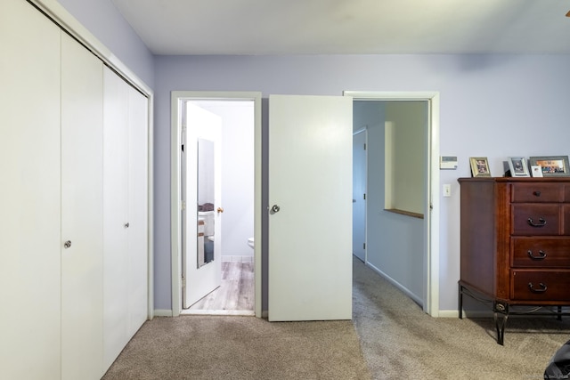 201 Greens Farm Rd Unit 201, Branford, CT 06405 - bedroom featuring carpet, a closet, and baseboards