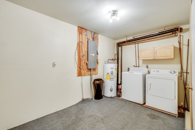 laundry area featuring electric panel, cabinet space, water heater, washing machine and clothes dryer, and carpet floors