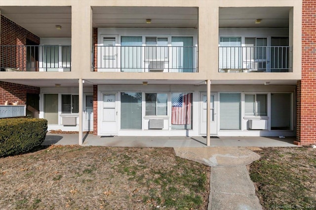 242 W Walk Unit 242, West Haven, CT 06516 - rear view of property with brick siding