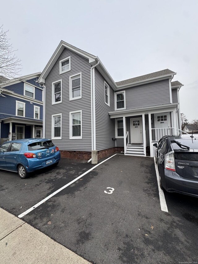 252-254 Liberty St, Meriden, CT 06450 - view of property featuring uncovered parking