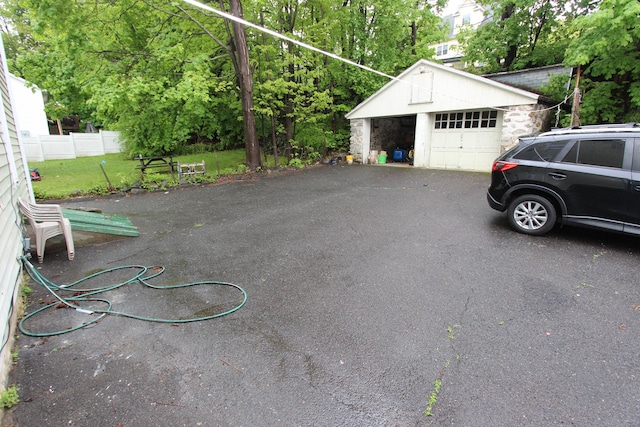detached garage with fence
