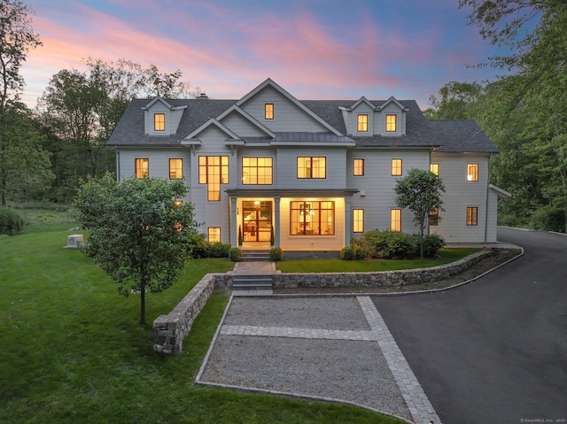168 Proprietors Xing, New Canaan, CT 06840 - view of front of property with a front yard and roof with shingles