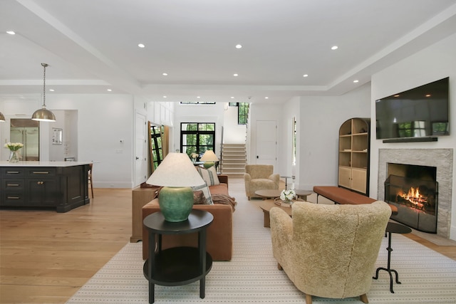 168 Proprietors Xing, New Canaan, CT 06840 - living area featuring light wood-type flooring, a fireplace, recessed lighting, and baseboards