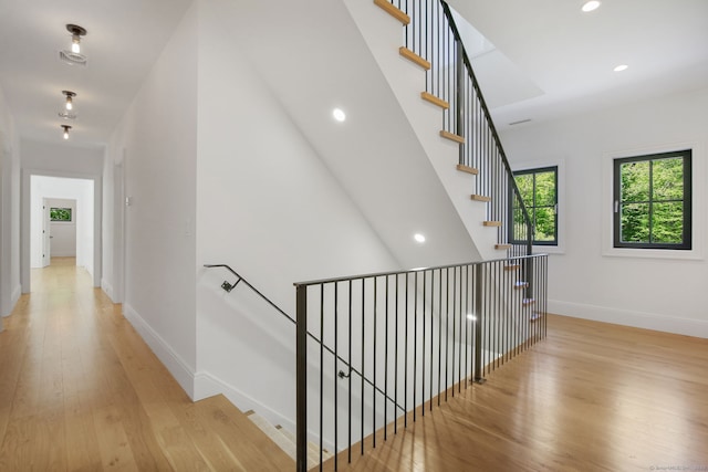 168 Proprietors Xing, New Canaan, CT 06840 - stairs with wood finished floors, baseboards, and recessed lighting