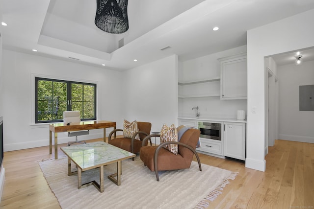 168 Proprietors Xing, New Canaan, CT 06840 - living room with light wood-style floors, baseboards, an office area, electric panel, and recessed lighting