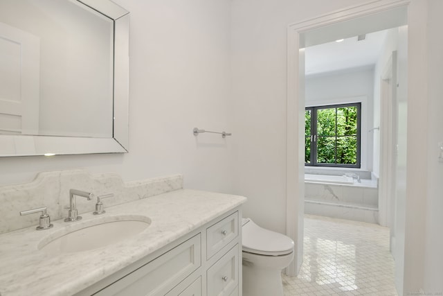 168 Proprietors Xing, New Canaan, CT 06840 - bathroom with toilet, vanity, tile patterned floors, and a tub with marble appearance