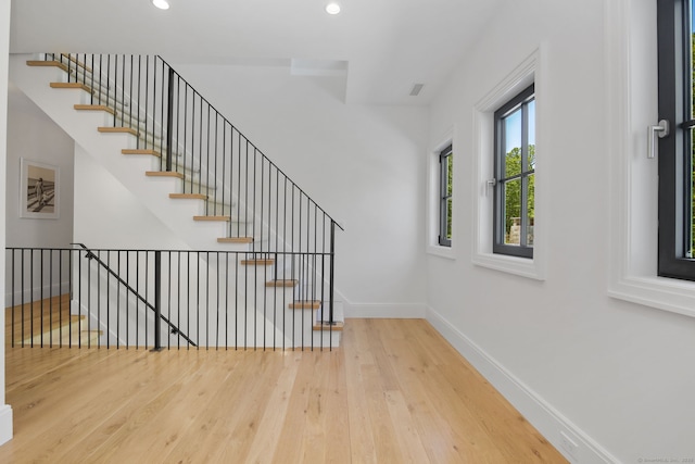 168 Proprietors Xing, New Canaan, CT 06840 - stairs with hardwood / wood-style floors, baseboards, and recessed lighting