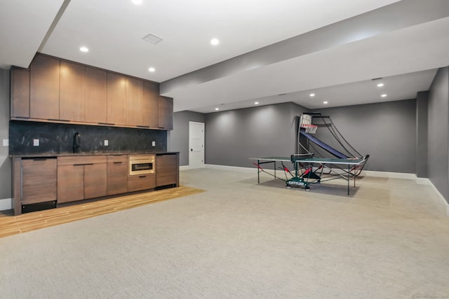 168 Proprietors Xing, New Canaan, CT 06840 - game room featuring baseboards, light colored carpet, a sink, and recessed lighting