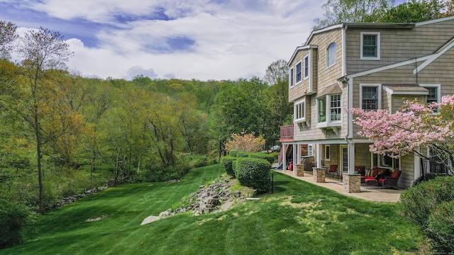 230 Ball Pond Rd, New Fairfield, CT 06812 - view of yard featuring a patio area and a wooded view