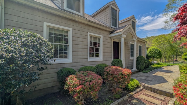 230 Ball Pond Rd, New Fairfield, CT 06812 - view of exterior entry with roof with shingles