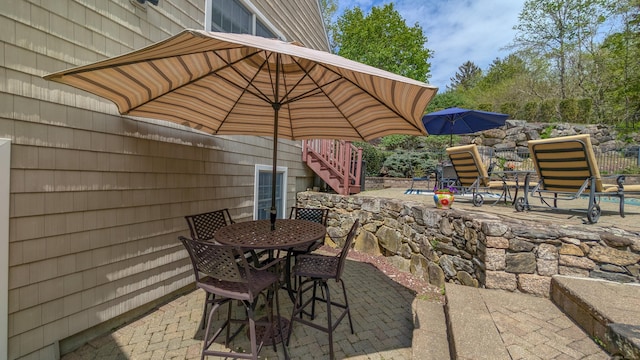 230 Ball Pond Rd, New Fairfield, CT 06812 - view of patio featuring stairway, fence, and outdoor dining area