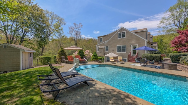230 Ball Pond Rd, New Fairfield, CT 06812 - view of pool with a fenced in pool, fence, an outdoor structure, a patio area, and a storage shed