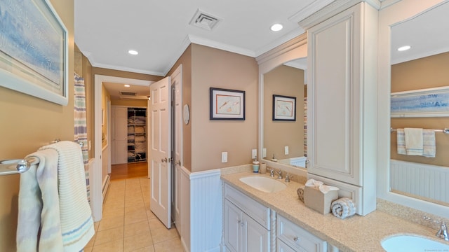230 Ball Pond Rd, New Fairfield, CT 06812 - bathroom with a wainscoted wall, crown molding, visible vents, and a sink