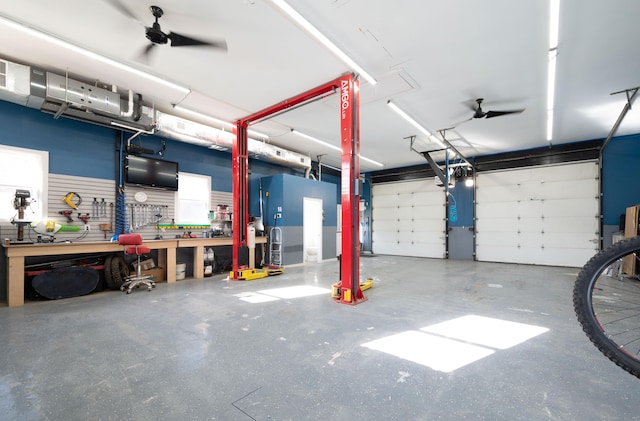 garage featuring a workshop area