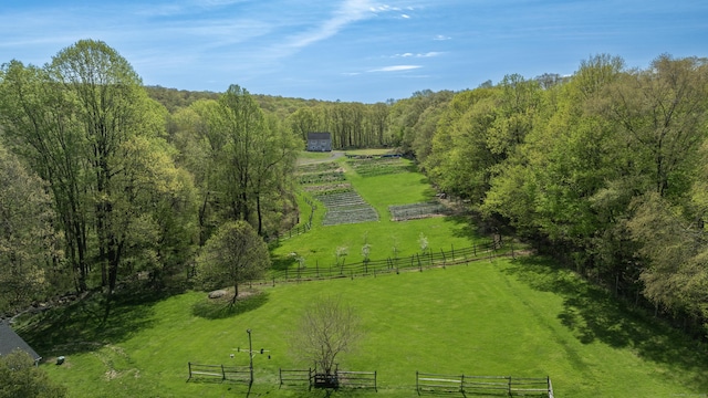 birds eye view of property with a rural view