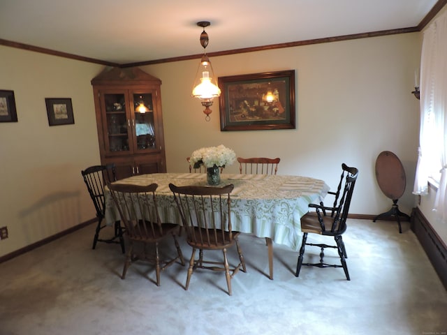 17 Broad Brook Rd, East Windsor, CT 06016 - dining space with crown molding, light colored carpet, and baseboards