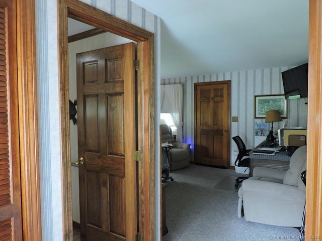 17 Broad Brook Rd, East Windsor, CT 06016 - hallway with wallpapered walls, a desk, and carpet floors