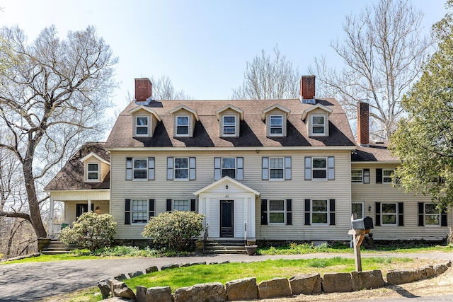 view of front of house with a chimney