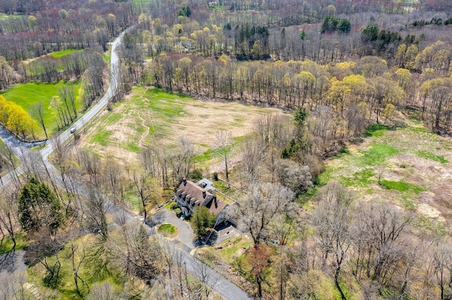 view from above of property featuring a forest