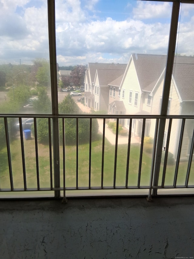 balcony featuring a residential view