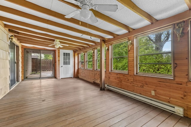 unfurnished sunroom featuring a baseboard radiator, a ceiling fan, and beam ceiling