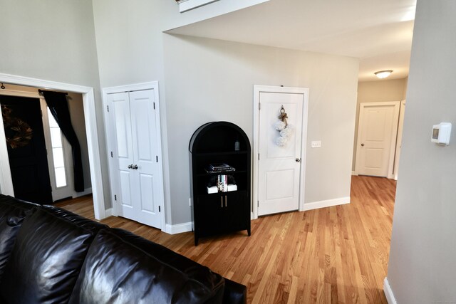 living room with light wood-style floors and baseboards