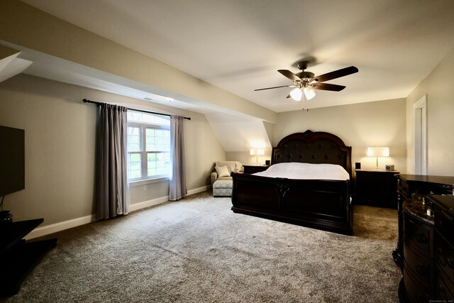 carpeted bedroom with baseboards and a ceiling fan
