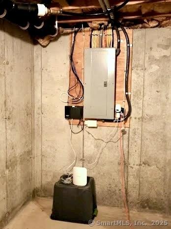 utility room featuring electric panel
