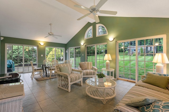 sunroom featuring vaulted ceiling