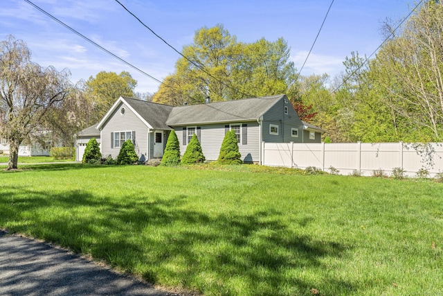 single story home with a shingled roof