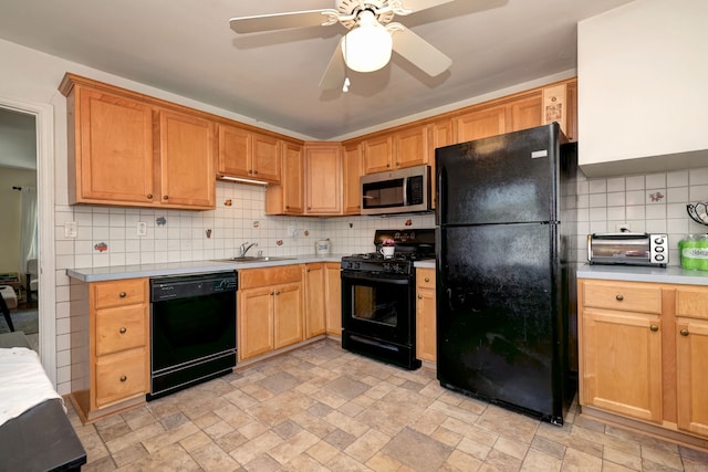 172 Alden St, Fairfield, CT 06824 - kitchen with black appliances, a sink, tasteful backsplash, and light stone finish floors