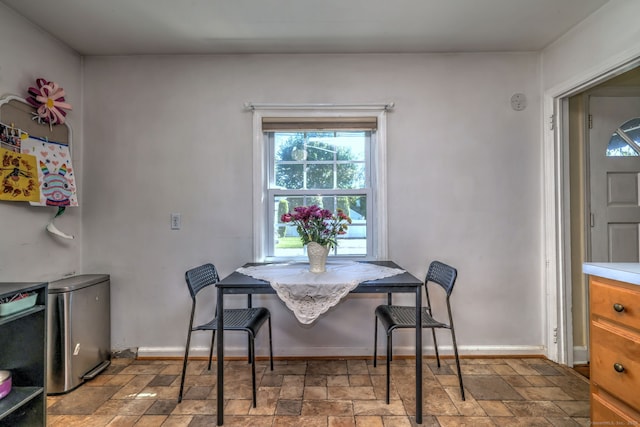 172 Alden St, Fairfield, CT 06824 - dining room featuring stone finish floors and baseboards