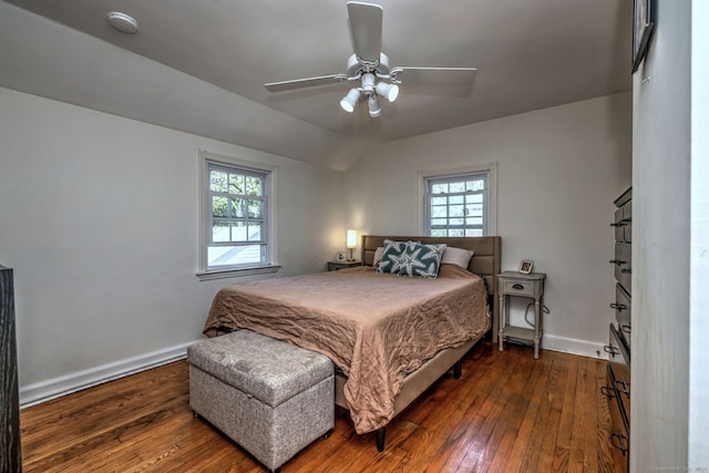 172 Alden St, Fairfield, CT 06824 - bedroom with dark wood-style flooring, multiple windows, baseboards, vaulted ceiling, and ceiling fan