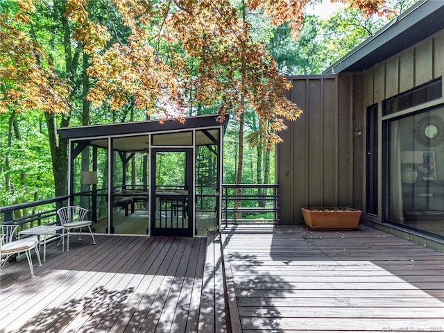 95 Shinar Mountain Rd, Washington, CT 06794 - wooden deck featuring a sunroom