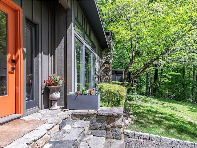 95 Shinar Mountain Rd, Washington, CT 06794 - view of side of property featuring board and batten siding and a lawn