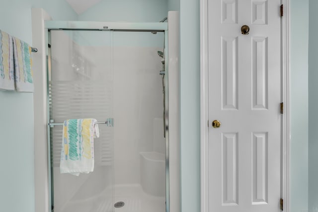 bathroom featuring a shower stall