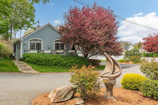 view of property hidden behind natural elements