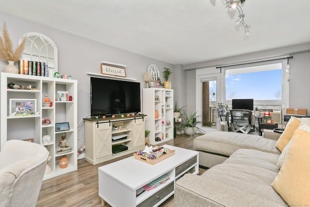 91 Strawberry Hill Ave Unit 733, Stamford, CT 06902 - living room with wood finished floors and a desk
