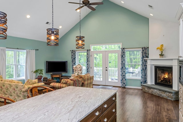 4 Aunt Park Ln, Newtown, CT 06470 - kitchen with high vaulted ceiling, open floor plan, dark wood-type flooring, dark brown cabinetry, and ceiling fan