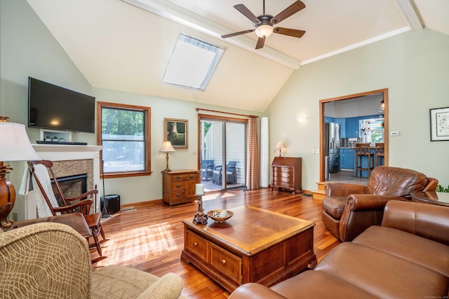 440 Huckleberry Hill Rd, Avon, CT 06001 - living room with lofted ceiling, ceiling fan, light wood-style floors, healthy amount of natural light, and ornamental molding