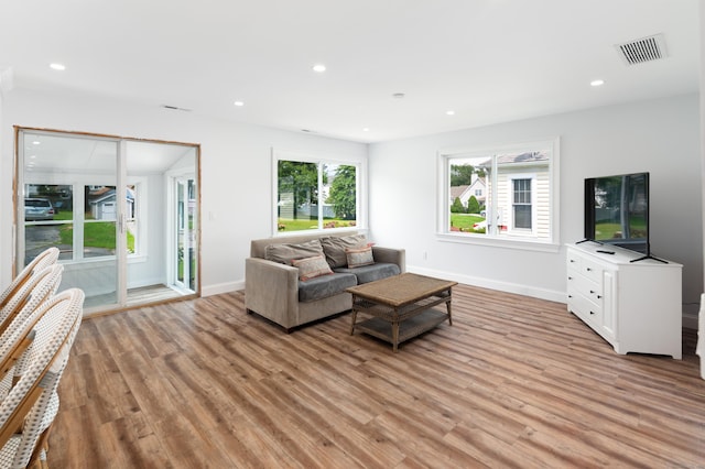 24 Sea Crest Ave, East Lyme, CT 06357 - living area with light wood-type flooring, baseboards, and recessed lighting