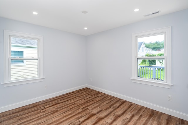 24 Sea Crest Ave, East Lyme, CT 06357 - unfurnished room with wood finished floors, baseboards, and recessed lighting