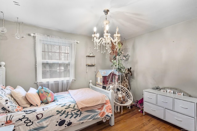 1 Glen Cir, Seymour, CT 06483 - bedroom featuring wood finished floors and a chandelier