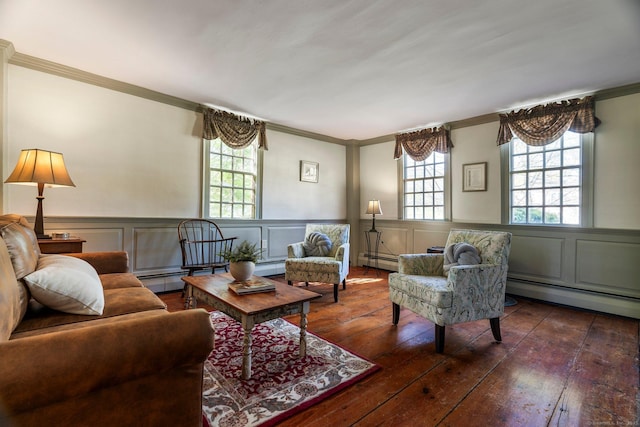 1696 Main St, Glastonbury, CT 06033 - living area with a baseboard heating unit, a wealth of natural light, crown molding, and hardwood / wood-style flooring