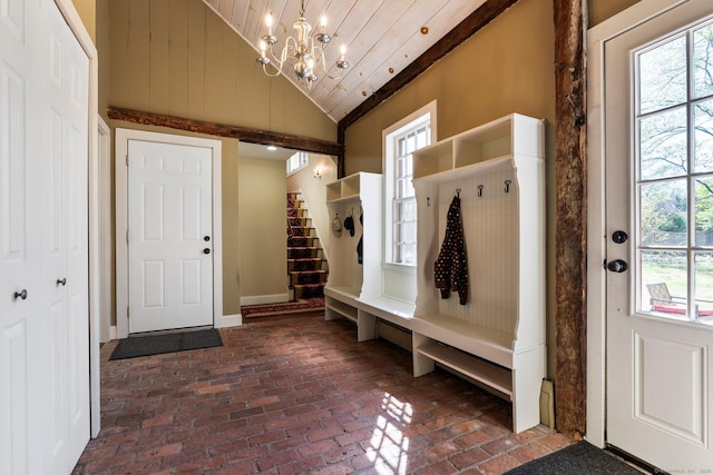 1696 Main St, Glastonbury, CT 06033 - mudroom featuring wooden ceiling, brick floor, a notable chandelier, and a healthy amount of sunlight