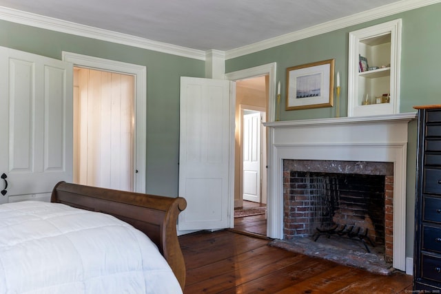 1696 Main St, Glastonbury, CT 06033 - bedroom featuring ornamental molding, a fireplace with raised hearth, and wood-type flooring